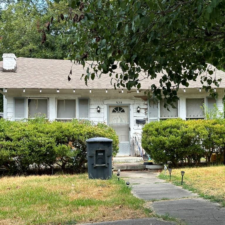 Boarded-up house in Shreveport Louisiana sold as-is for cash